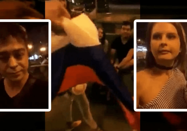 В центре Киева проучили фанатов «русского мира», которые выпивали под флагом РФ (Видео)